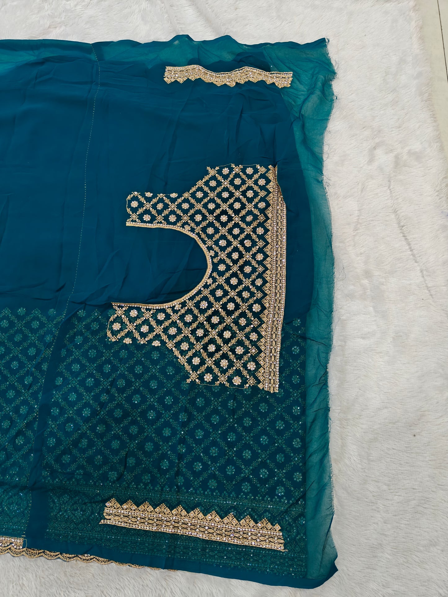Grace Meets Glamour – Georgette Saree with Zircon Sparkle