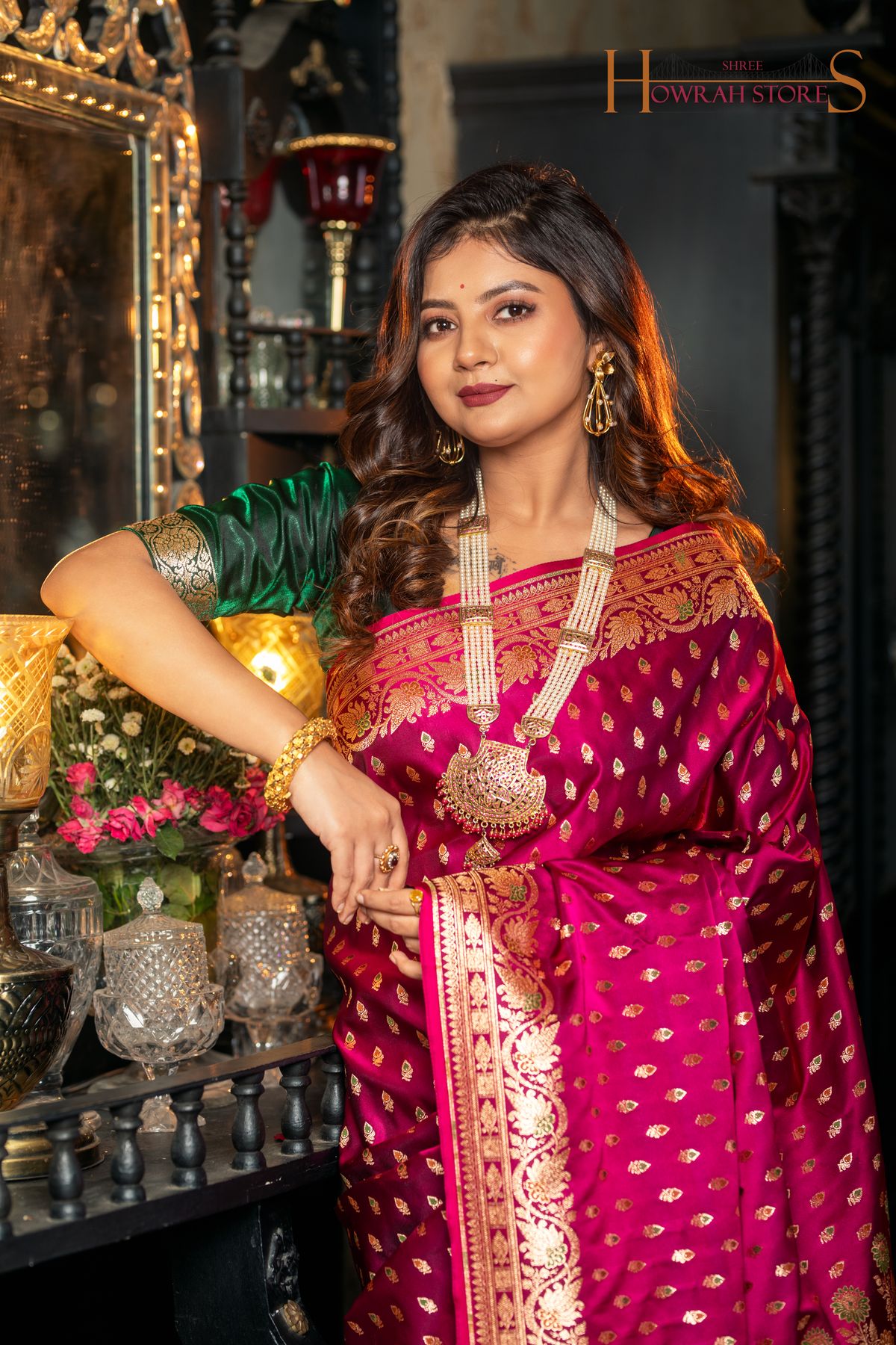 A model wearing a saree from Shree Howrah's Banarasi Silks