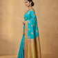 Peacock Paithani Butta Khaddi Crepe Silk Saree with Contrast Zari Border in Turquoise