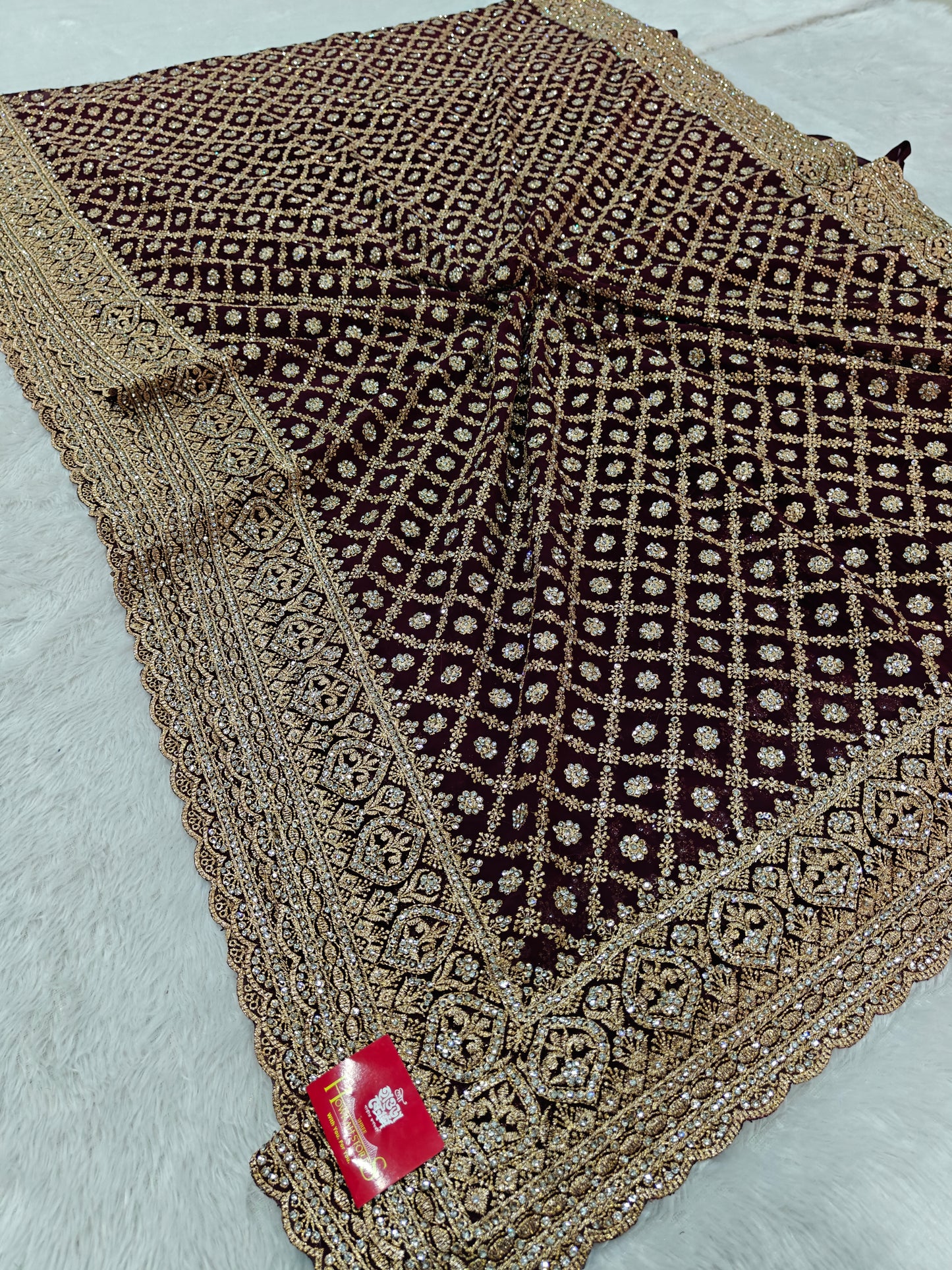 Elegant Radiance in Every Drape – Georgette Saree with Zircon Stone Work