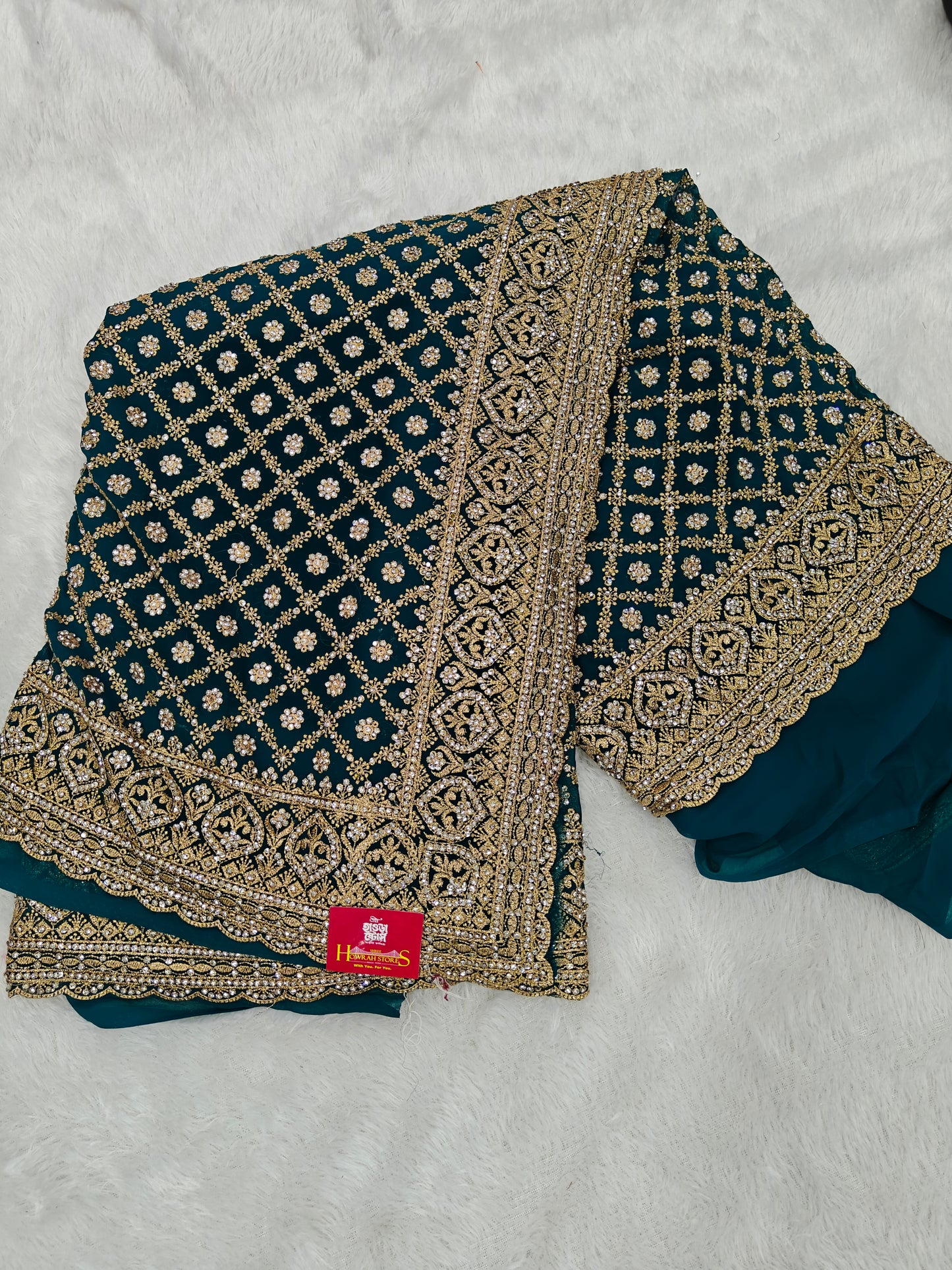 Grace Meets Glamour – Georgette Saree with Zircon Sparkle
