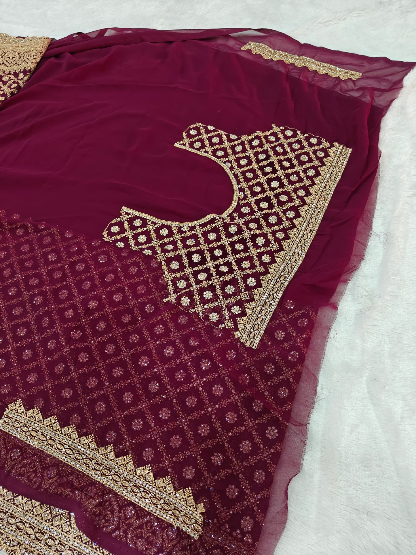 Elegant Radiance in Every Drape – Georgette Saree with Zircon Stone Work